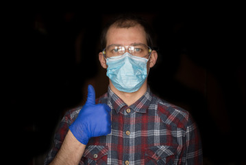 doctor in protective medical mask and glasses