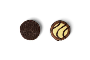Chocolate cookies with milk filling isolated on white background.