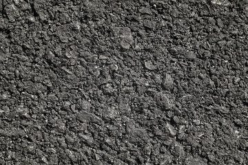 Asphalt texture rough road, 
Tarmac dark grey grainy, Seamless  background,Close up Top view