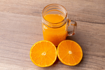 Natural orange juice in a small jug