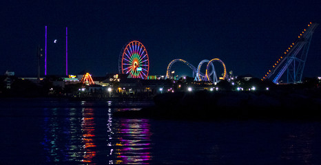 Jolly Roger Amusement Park in Ocean City, Maryland. The city It features miles of beach and a wooden boardwalk lined with restaurants, shops and hotels. © othman