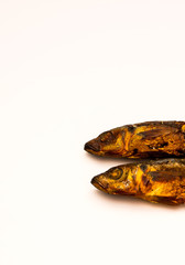 Freshly smoked fish isolated against a white background