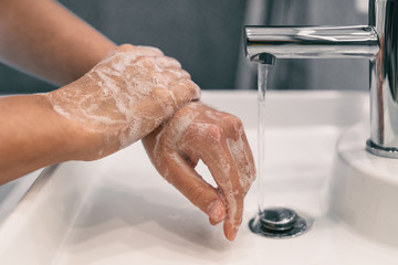 Hand washing personal hygiene woman washing hands rubbing soap for 20 seconds following steps,...