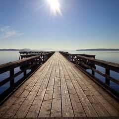 Fototapeta na wymiar wooden pier at sunset
