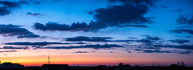 Fototapeta na wymiar Sunset panorama with clouds high resolution