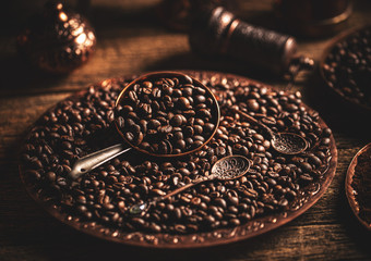 Coffee beans in copper plate