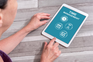 Time management concept on a tablet