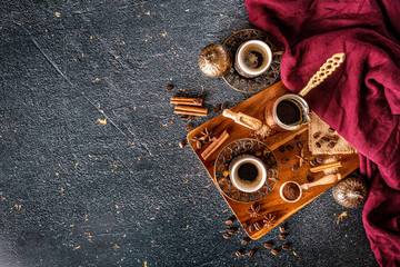 Aerial view of a coffee cup on modern black background