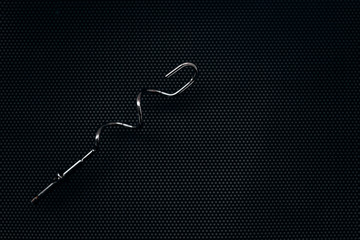 screws on a black background frame