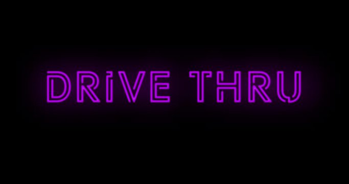 Flashing pink/purple DRIVE THRU sign on and off with flicker