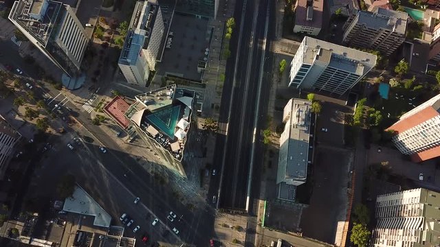 Santiago de Chile. Cinematic Drone Aerial View of Road Traffic Between Modern Skyscrapers