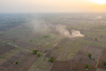 Aerial view, stubble burning Rice straw creates haze problems. And dust, rural farming areas