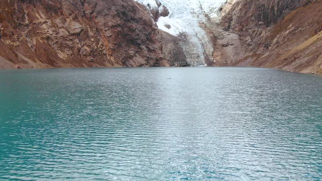 Arhuaycocha lake, peruvian andes, santa cruz trekking, fly over the lake, final ice slice, global warming effects