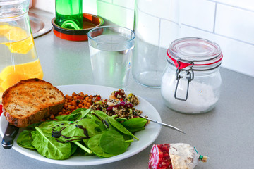 A plate of spinach with balsamic vinegar with couscous