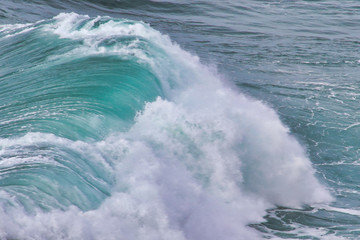Aerial view of  surfer riding big wave on the North Shore, Hawaii. Drone Photo