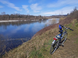 Fototapeta na wymiar bicycle travel along the river