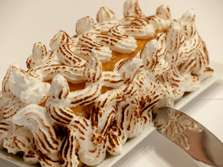 Meringue pie with a knife