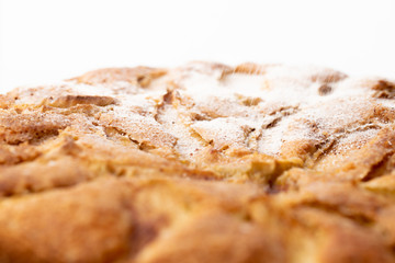 details of fresh baked apple pie on white background