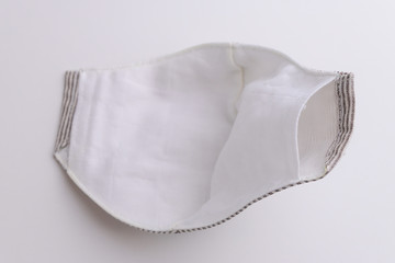 cloth face mask design handmade from fabric cotton inside material with salu muslin soft textile, object on white background