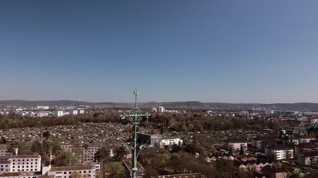 City View from the Top cross of an cient gothic chapel onto a german town