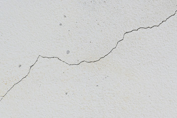 cracked on old white wall rough texture weathered background