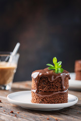 Chocolate mini cake on the wooden table
