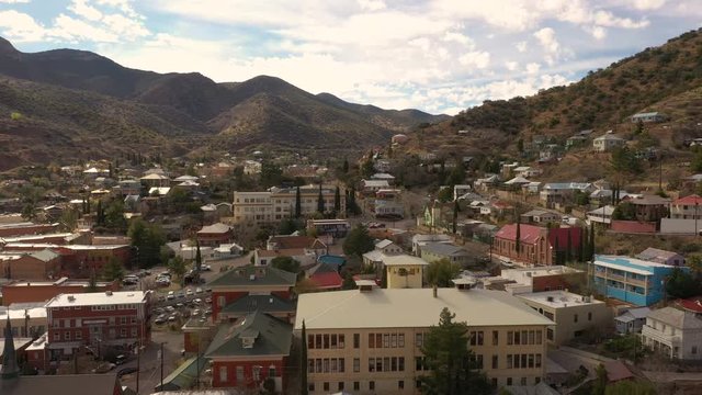 Flying Over Old Buildings In The Copper City Bisbee, Arizona, USA Surrounded In Mule Mountains.- aerial shot