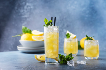 Fresh summer cocktail with lemons