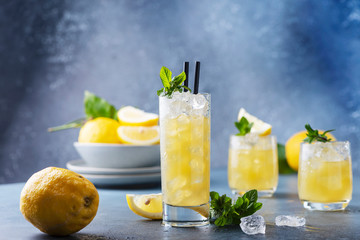 Fresh summer cocktail with lemons