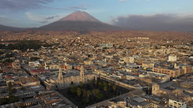 aerial shot of arequipa city in peru with a volcano