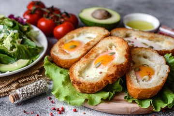 Delicious breakfast with grunts, eggs, avocado and cherry tomatoes