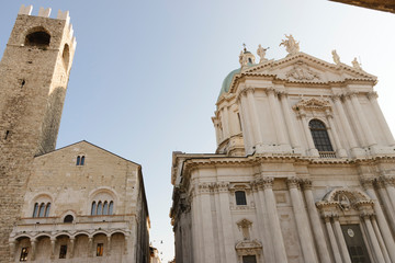 Palazzo Broletto with the Torre del Pgol and cathedral of Santa Maria Assunta known as the new duomo, Brescia, Italy.