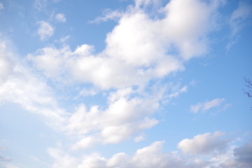 Naklejka na ściany i meble Clear blue sky and white clouds summer background