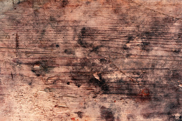 Wooden texture with scratches and cracks. It can be used as a background