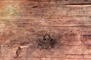 Wooden texture with scratches and cracks. It can be used as a background