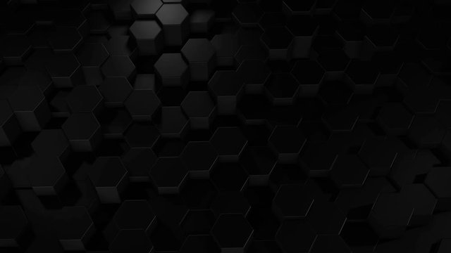 An abstract hexagonal geometric black surface cyclically moves in virtual space. Chaotic vibrations of geometric shapes. Creating a dynamic wall of hexagons
