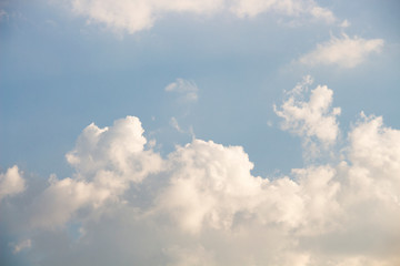 Bright blue sky with white clouds for background or wallpapers