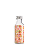 full color topping sprinkle in glass bottle on isolated white background