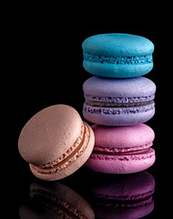 Colorful macaroon each other and one next