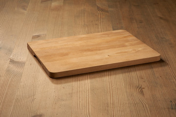 wood cutting board on table