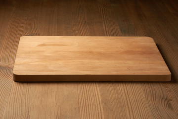 wood cutting board on table