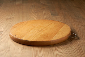 wood cutting board on table