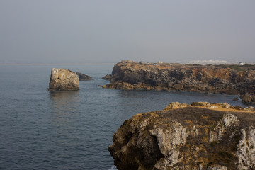 Fototapeta na wymiar Papoa cliffs and sea in Peniche. Portugal