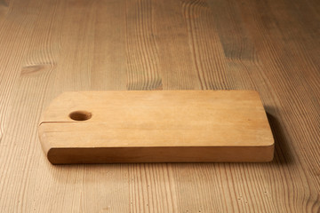 wood cutting board on table