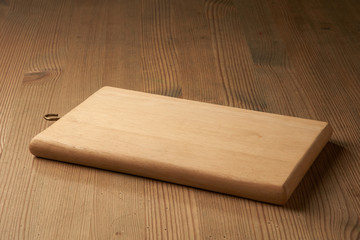 wood cutting board on table