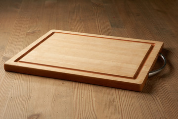 wood cutting board on table