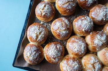 Fresh homemade buns on table