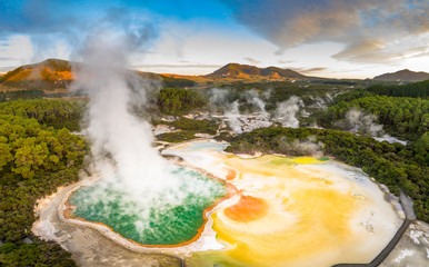 Geothermal Landscape with hot boiling mud and sulphur springs due to volcanic activity in Wai-O-Tapu, Thermal Wonderland New Zealand - obrazy, fototapety, plakaty