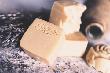 pieces of handmade soap on burlap