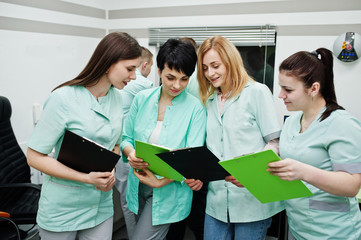 Medical theme.Observation room with a computer tomograph. The group of female doctors with...